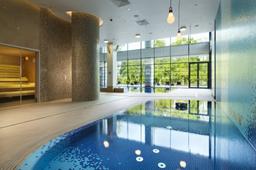 The Spa at DoubleTree by Hilton Hotel & Conference Centre Warsaw Logo