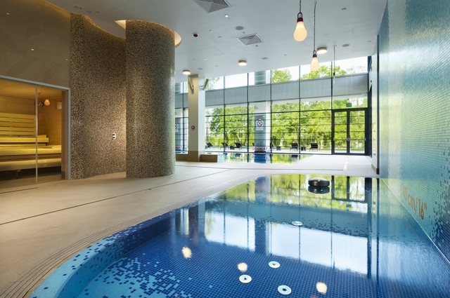 The Spa at DoubleTree by Hilton Hotel & Conference Centre Warsaw Logo